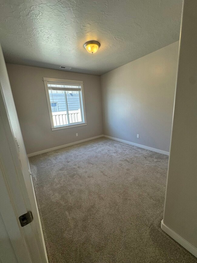Building Photo - 10496 W Daylily Ct