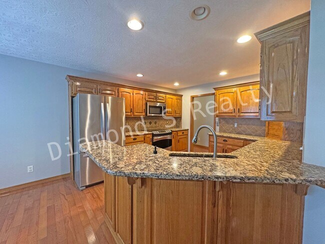 Building Photo - Gorgeous Custom All Brick Home in Fox Grap...