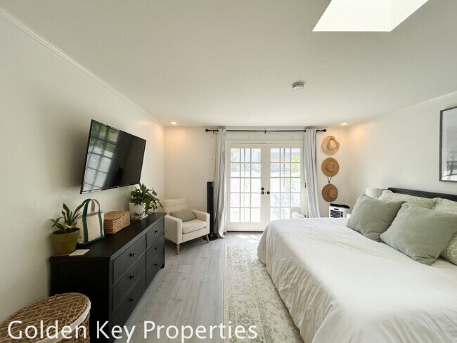 Building Photo - Welcome to this stunning ***unfurnished*** tri-level condo in the desirable Casitas de la Costa c...