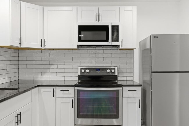 Building Photo - Everything upgraded on this 4 bedroom — to...