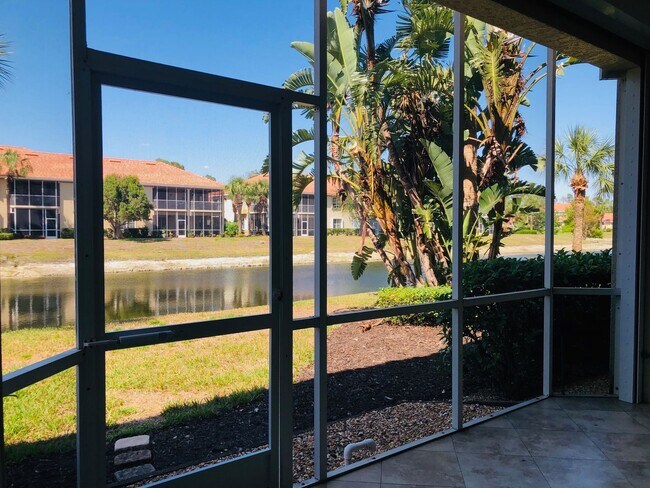 Building Photo - Experience Bell Tower Park. GATED ground floor 2 Bed 2 Bath Den 1 Car Garage Condo.