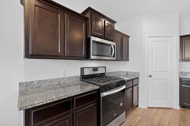 Building Photo - 8425 Wildwest Dr