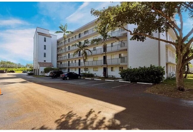 Building Photo - 8750 N Sherman Cir