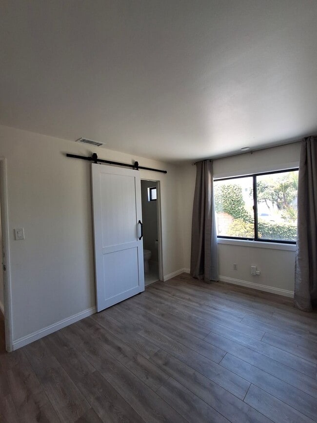 Building Photo - Beautifully Renovated Home with 2-Car Gara...