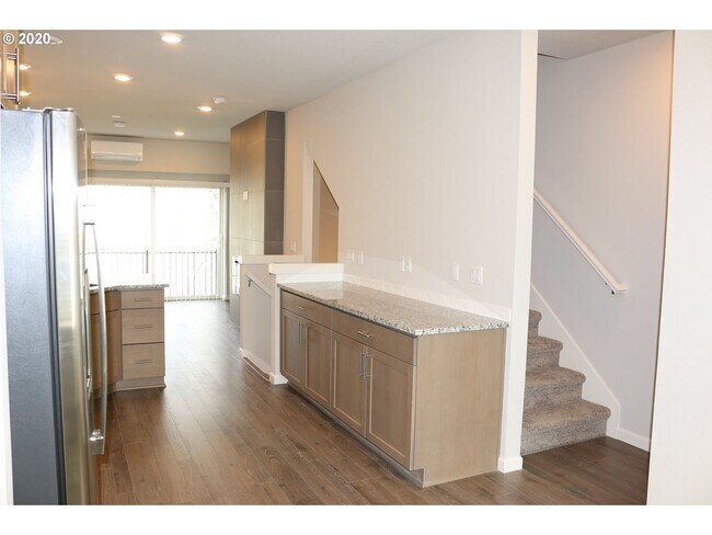 Building Photo - Modern 3-Bedroom Townhome-Style Home with Attached Garage, Private Patio & En-Suite Bathrooms in ...