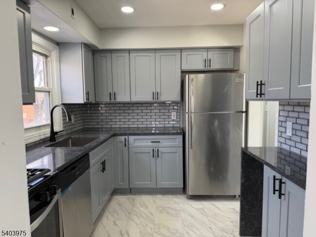 Building Photo - 10-06 1st St