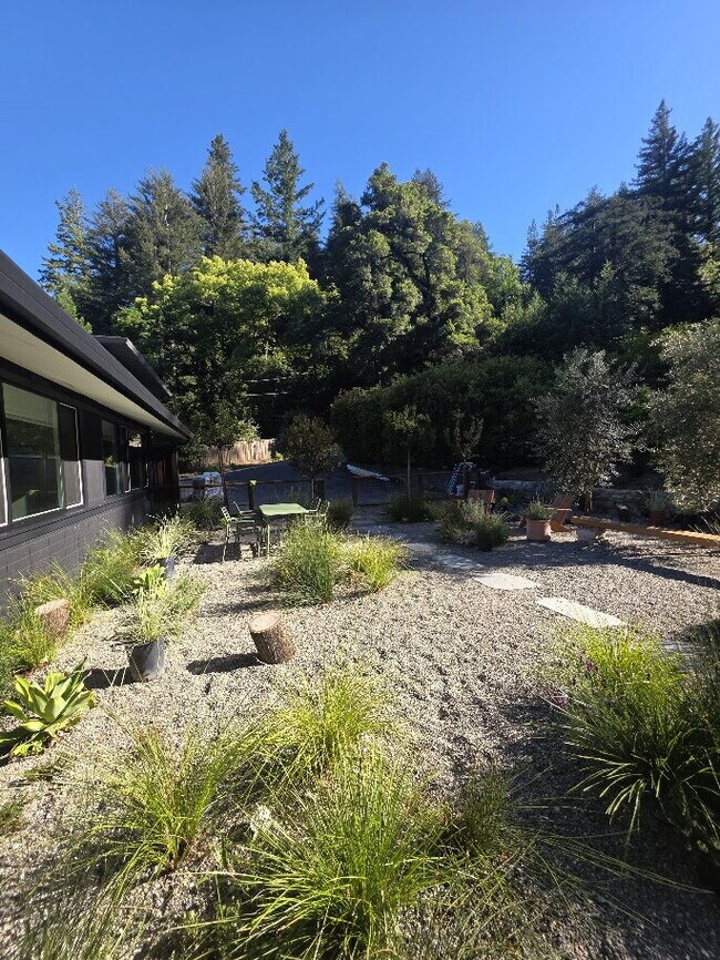 Building Photo - Breathtaking Home offers flexible living with bonus rooms ideal for an office, art studio, gym, o...