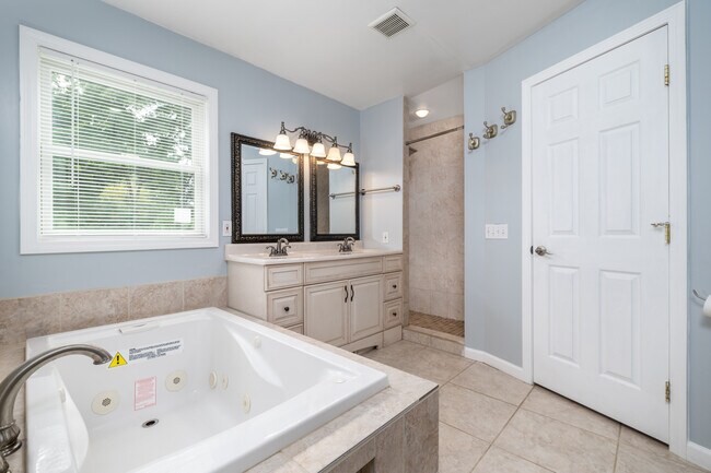 Primary bath with walk in shower - 1099 North Ave