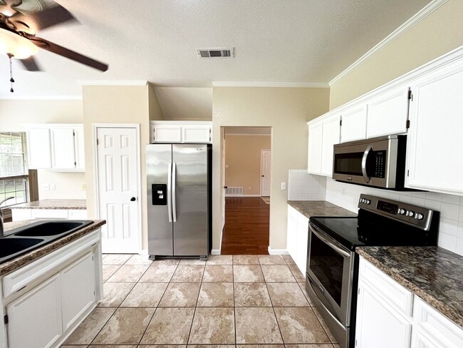 Building Photo - Available NOW!!!! This beautiful 2 story, 4 bedroom, 2 bath, two car garage with garage door open...