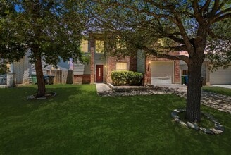 Building Photo - 4BR Home with Open Living Area & Included Appliances
