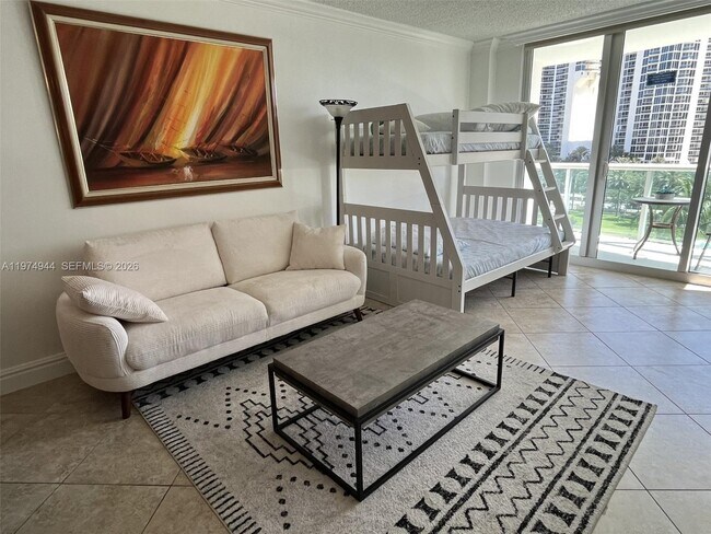 Building Photo - 19370 Collins Ave