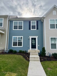 Building Photo - Modern 4 BR | 2.5 BA Townhome with Garage ...