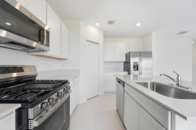 Building Photo - 10739 NW Moon Rise Ln