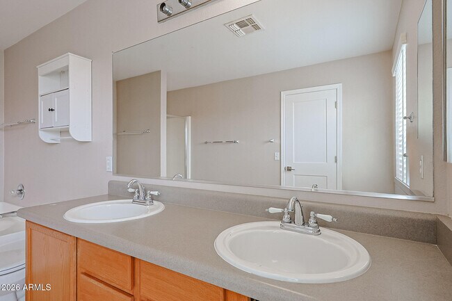 Building Photo - 15569 W Gelding Dr