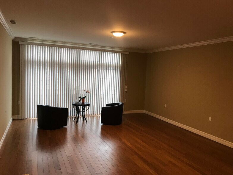 Hardwood floors Doorwall to Patio Balcony - 3247 Biddle Ave