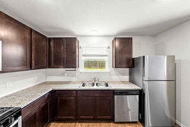 Building Photo - New Rental Alert! 2 Weeks Free Rent with 15 Month Lease