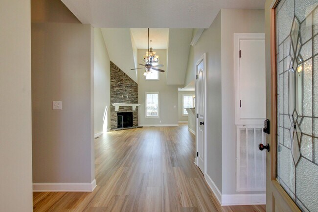 Building Photo - Fantastic Open Floor Plan Home With Stone Front Fireplace, Stainless Steel Appliances, And Close ...