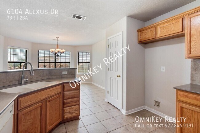 Building Photo - 6104 Alexus Dr