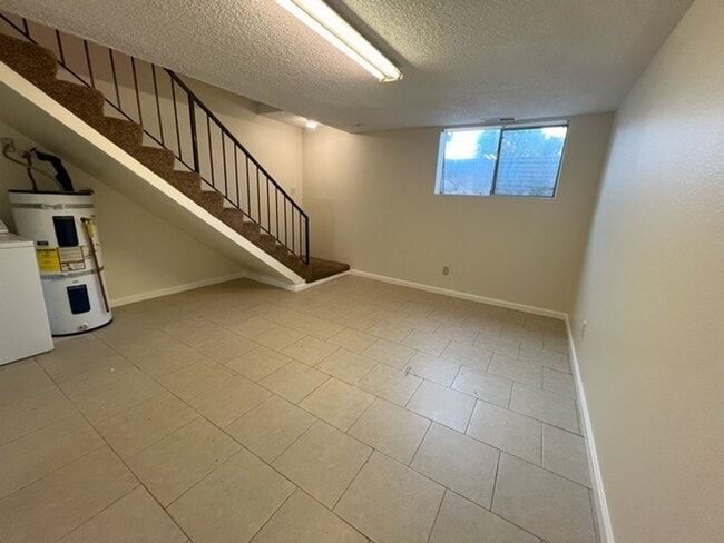 Building Photo - Three Bedroom Two and half Bathroom Tri...