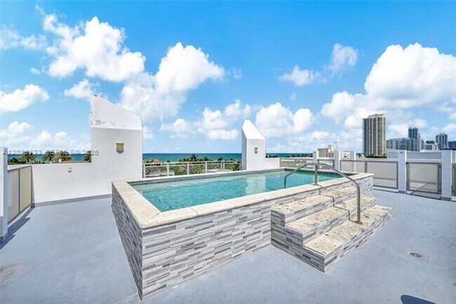 Building Photo - 7728 Collins Ave