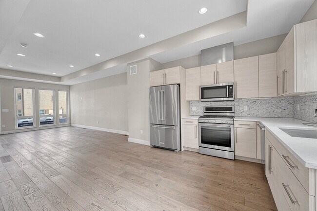 Building Photo - $3,145.95- 3 Bed, 3.5 Bath Townhome in Denver with Central AC and In Unit Laundry