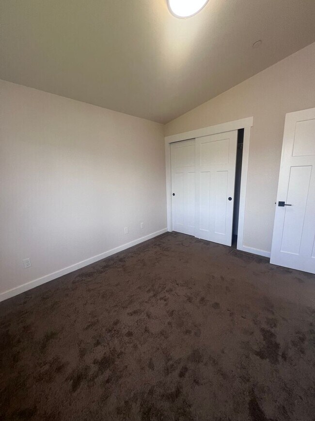 Building Photo - 2 Bedroom 1 bath house with extra large double car garage and extra storage space!