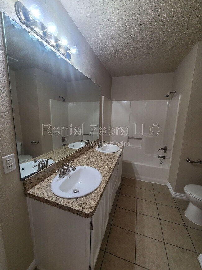 Building Photo - 7605 Misty Ridge Dr N
