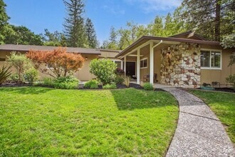 Building Photo - Updated 3 bedroom + office & pool, single ...