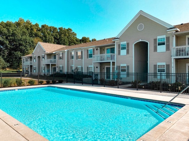 Dive into relaxation in our heated pool, offering a perfect escape during any season. - Stoneridge Apartment Homes