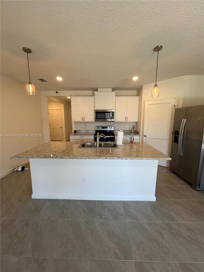 Building Photo - 7144 Topaz Dr