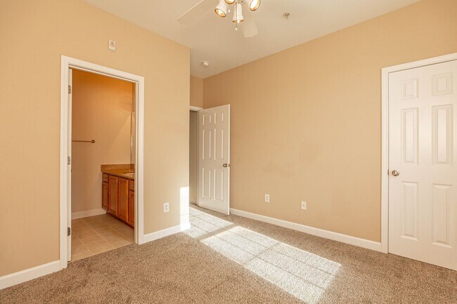 Building Photo - Located just Steps from Shopping, Dining, ...