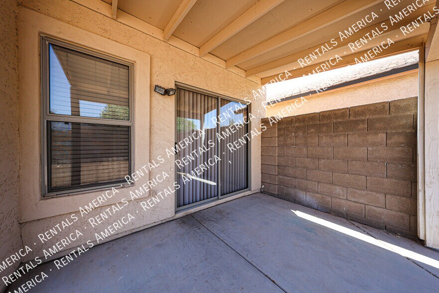 Building Photo - 10060 E Capri Ave