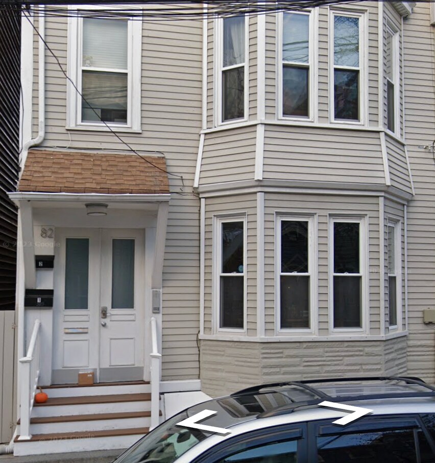 Front of building - quiet residential street, 5 minute walk from Maverick T stop MBTA Blue Line - 82 Webster St