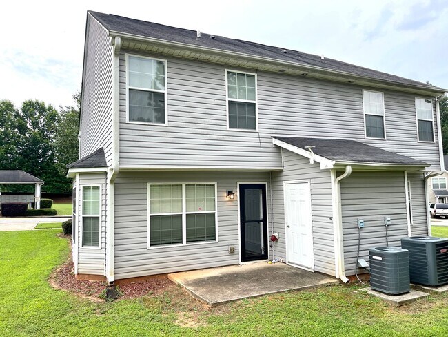 Building Photo - Welcome to this stunning 2-bedroom, 2.5 bathroom corner townhome located in the vibrant city of A...