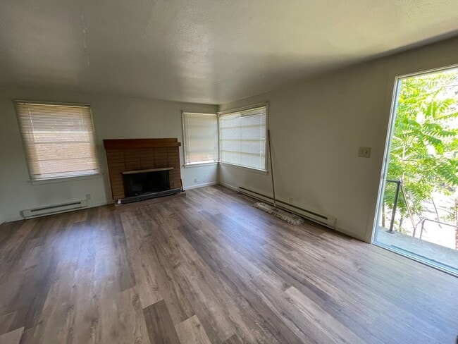 Building Photo - 2-bedroom Home with Basement & Carport