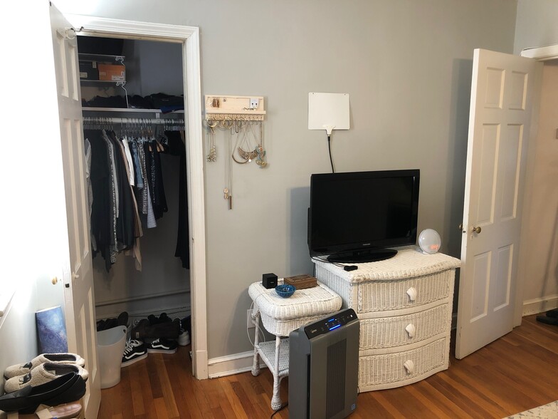 Primary bedroom with lots of natural light and closet - 519 N Payne St