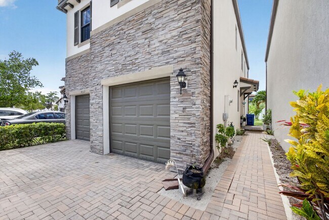 Building Photo - Gated community new construction | 4BR 2.5 Riviera Beach Single Family Home