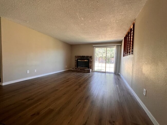 Building Photo - Three bedroom home with large yard| Available July!