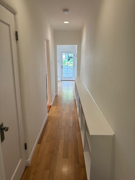 Reverse of hallway from bed & bath to livingroom & front door - 1722 Redcliff St