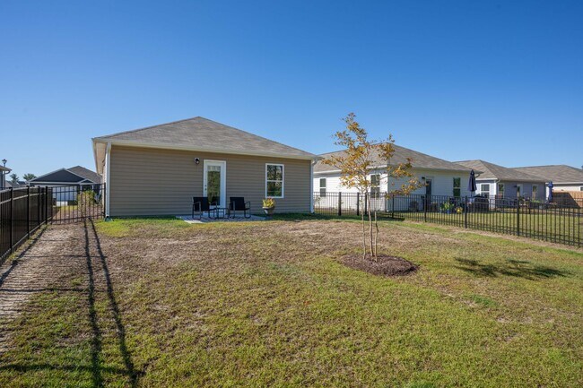 Building Photo - Charming 4-Bedroom Home in Desirable Waterside Community – Surf City, NC