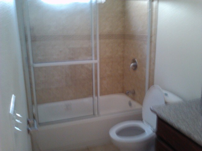 Downstairs bathroom tub/shower - 454 E 47th St