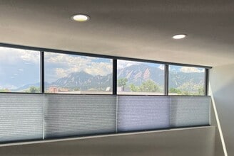 Building Photo - Bright South-Facing Condo with Stunning Fl...