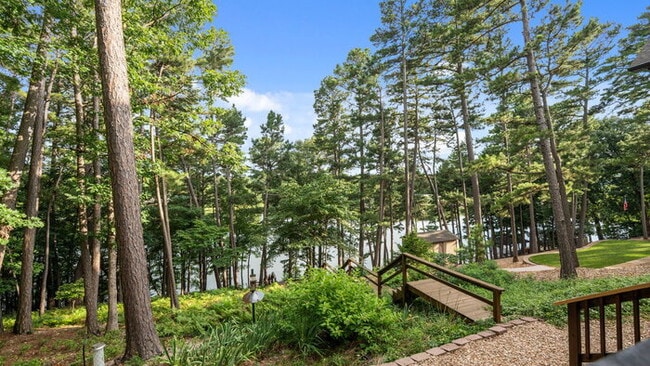 Building Photo - Serene Bella Vista Lakeside 4 bedroom