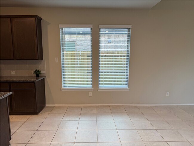 Building Photo - 8711 Windsong Trail Dr