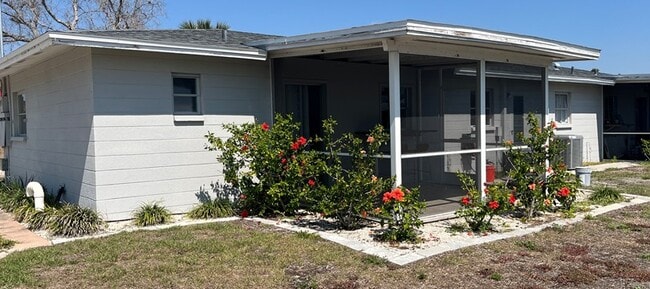 Building Photo - Lost in Paradise USA LLC