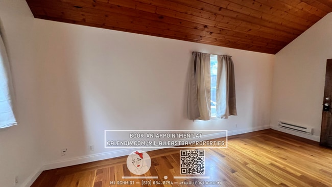Building Photo - Quaint cottage with hardwood floors, private entrance and patio, surrounded by lush gardens!