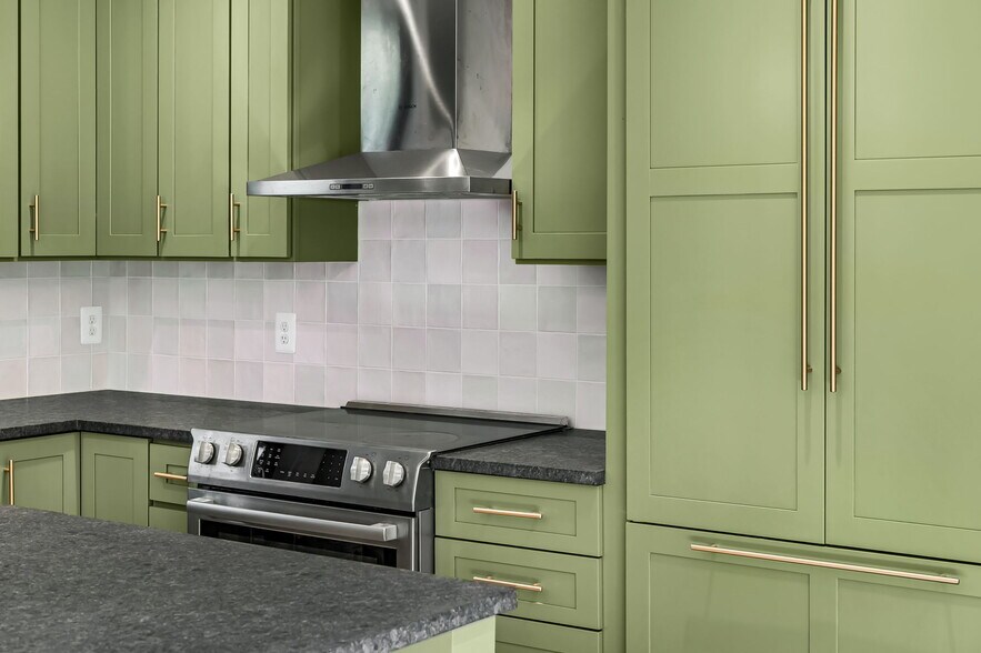 Bosch appliances blend with the cabinets - 4629 Keswick Rd