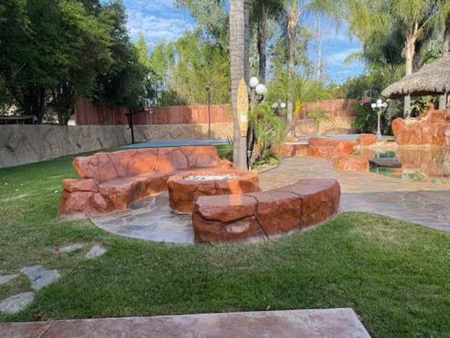 Building Photo - Gated estate with a backyard oasis