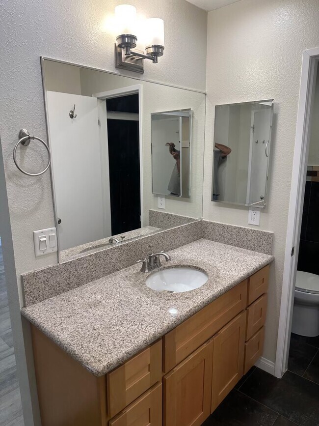 Master Bath with separate toilet room. - 2411 Prospect Ave