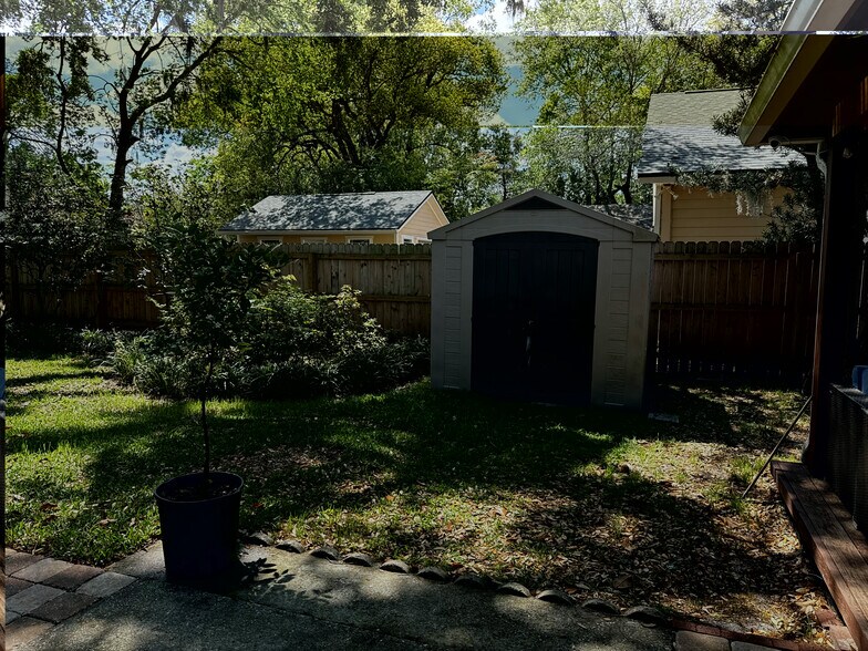 Included Rubbermaid outdoor shed for bicycles, yard equipment, holiday decorations, etc. - 3880 Walsh St